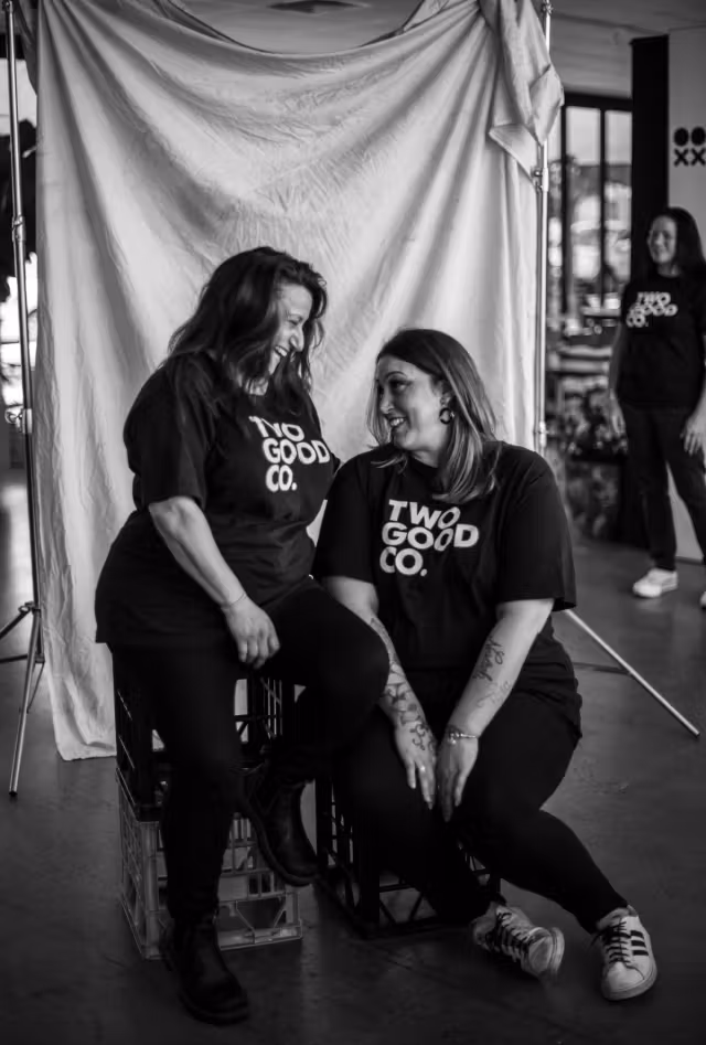 Two women smiling