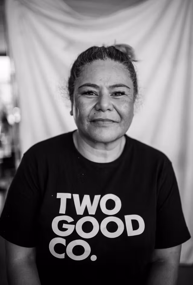 A woman smiling at the camera